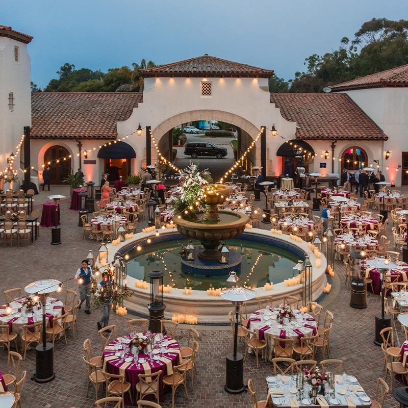 gala setup with round tables surrounding a central courtyard in Santa Barbara