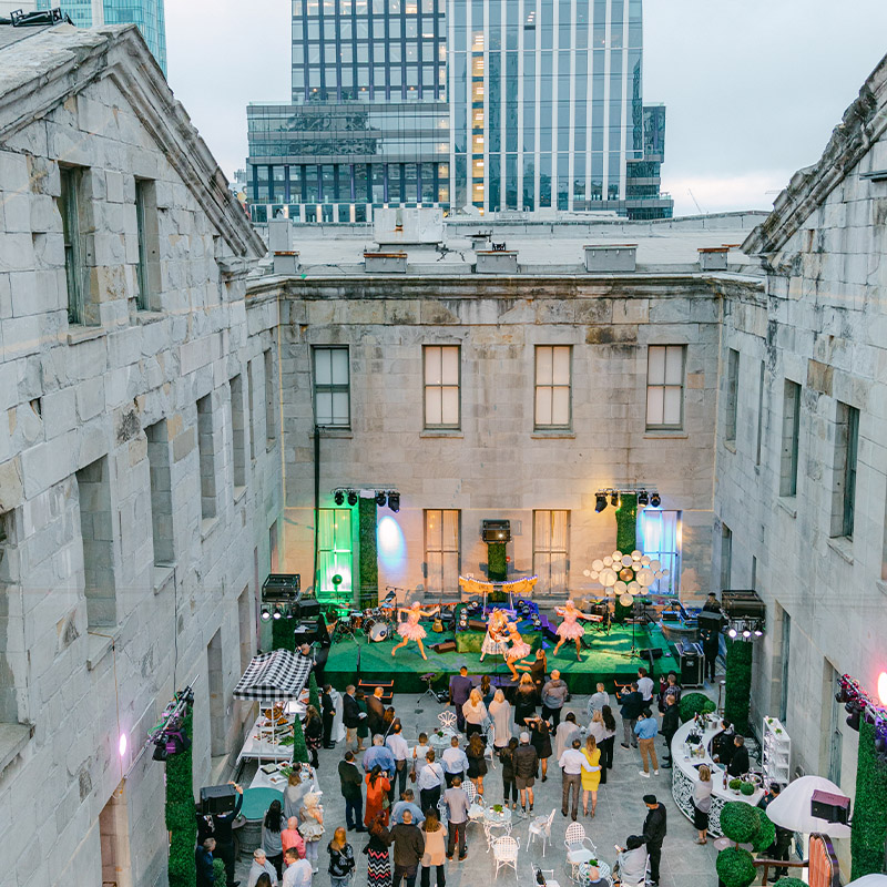 an event space inside an urban district with nature inspired decor